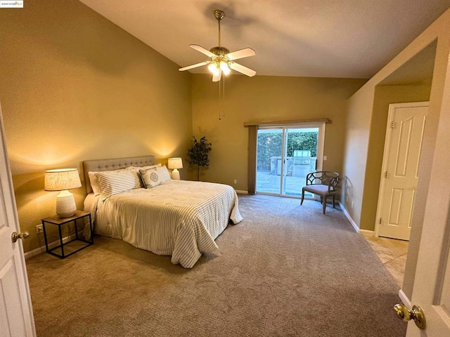 carpeted bedroom with access to outside, ceiling fan, and vaulted ceiling