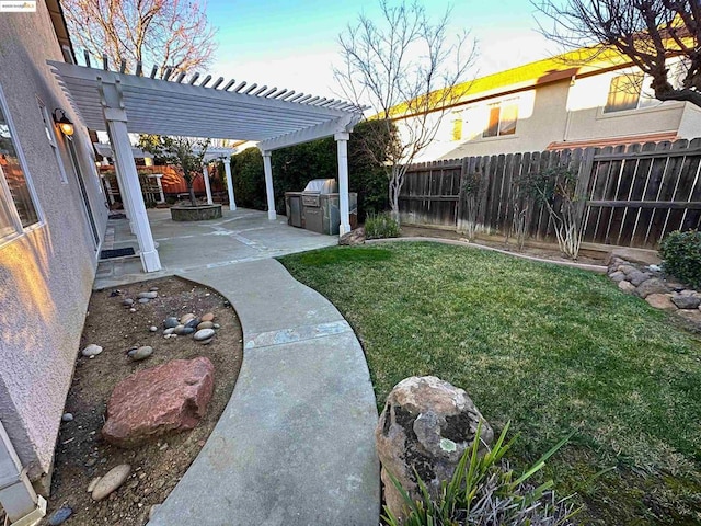 view of yard featuring a pergola and a patio area