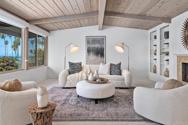 living room featuring built in shelves, vaulted ceiling with beams, carpet, and wooden ceiling