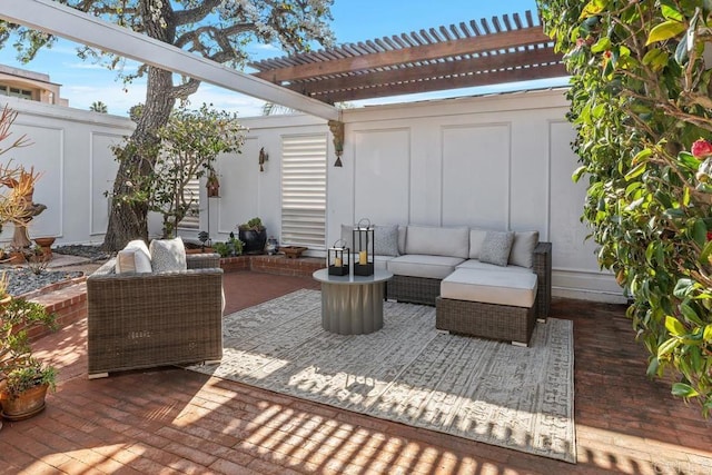 view of patio / terrace with outdoor lounge area and a pergola