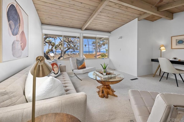 carpeted living room featuring lofted ceiling with beams and wooden ceiling