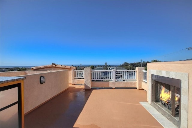 view of patio featuring a premium fireplace