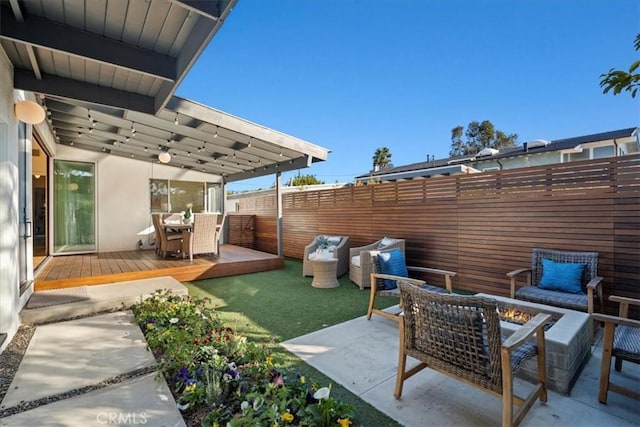 view of patio / terrace featuring an outdoor living space, a pergola, and a deck