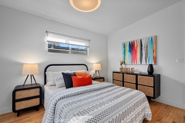 bedroom with light wood-type flooring