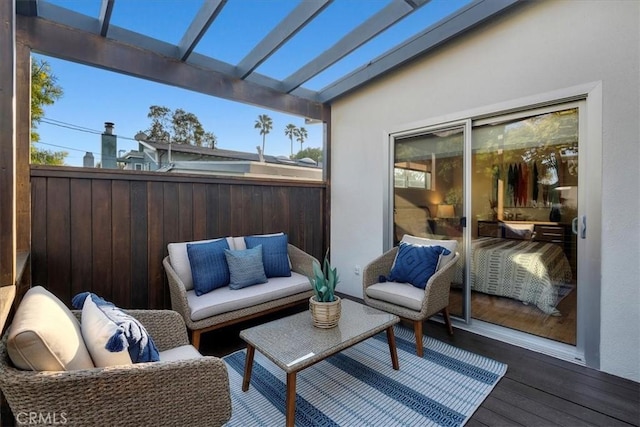 exterior space featuring vaulted ceiling with skylight