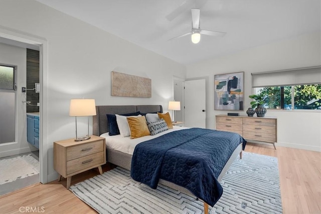 bedroom with ceiling fan and light hardwood / wood-style floors