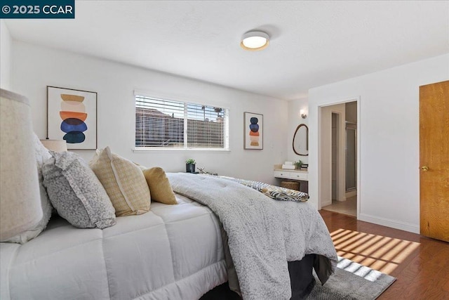 bedroom with wood-type flooring