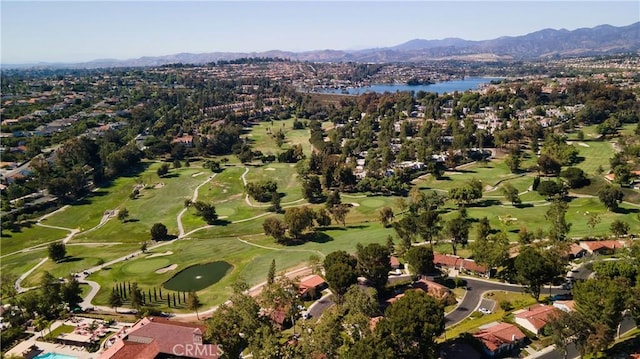 bird's eye view with a water and mountain view