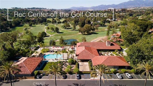 birds eye view of property featuring a mountain view and golf course view