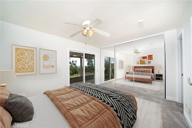 bedroom with ceiling fan, carpet floors, a closet, and access to outside