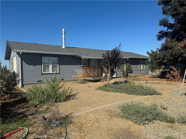 view of front of home with a wooden deck