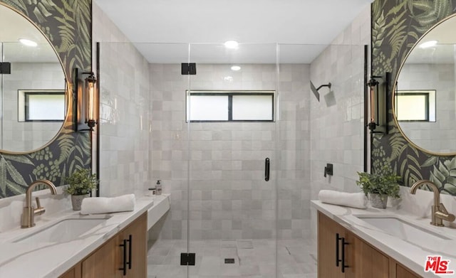 bathroom with vanity and walk in shower