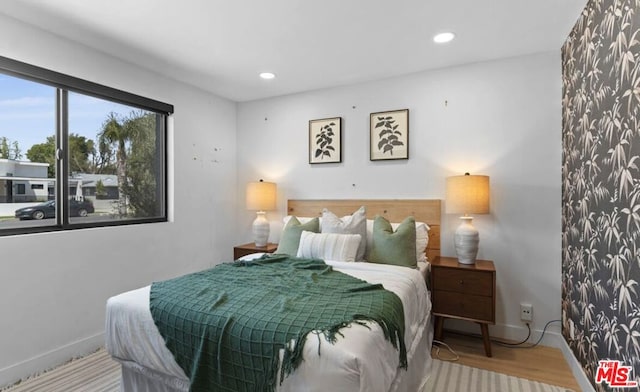 bedroom featuring hardwood / wood-style floors