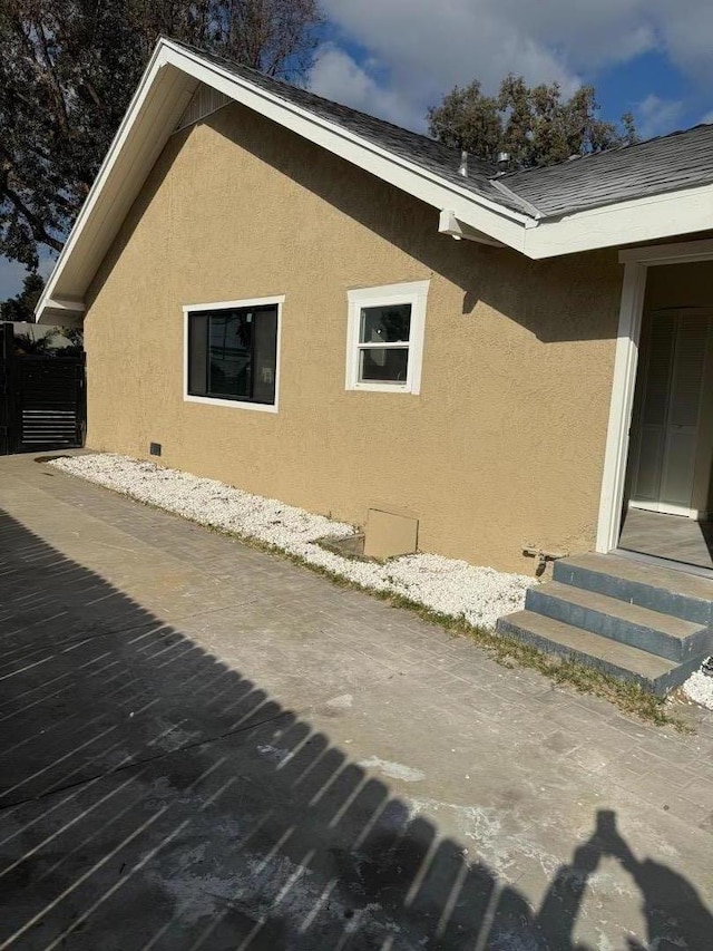 view of home's exterior featuring a patio area