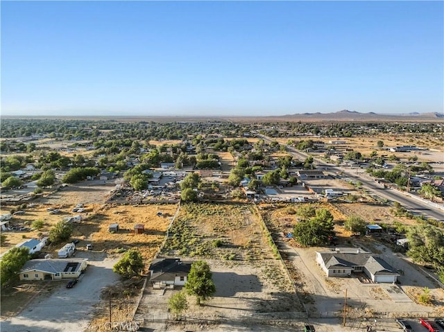 drone / aerial view featuring a mountain view