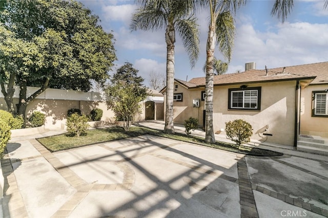 view of front of property featuring a patio