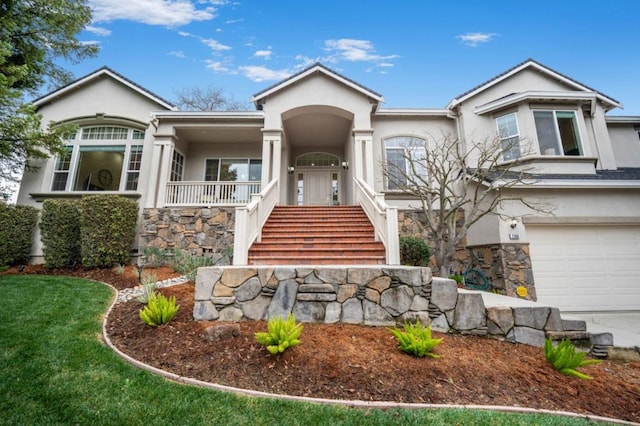 view of front of home with a garage