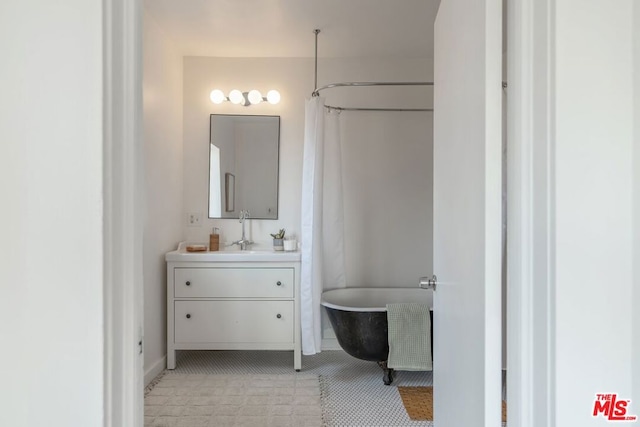 bathroom with independent shower and bath and vanity