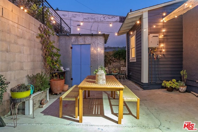 view of patio / terrace with a storage unit