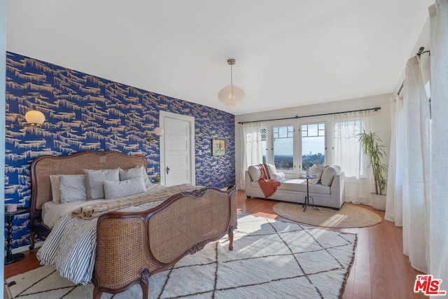 bedroom featuring hardwood / wood-style flooring