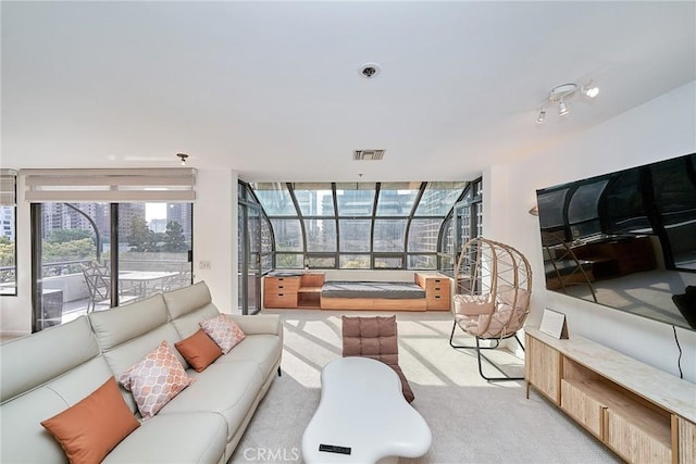 living room with light colored carpet