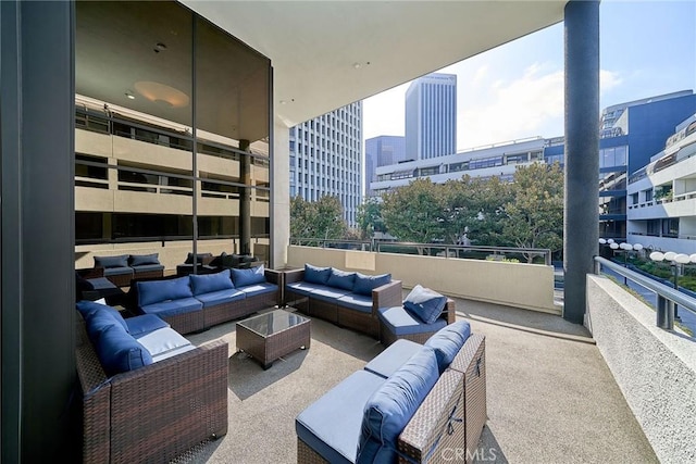 interior space with an outdoor living space and a balcony