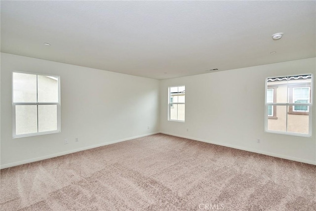 view of carpeted spare room