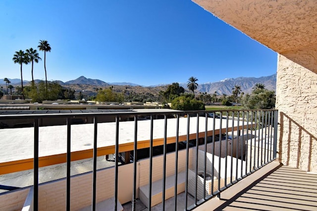 balcony featuring a mountain view