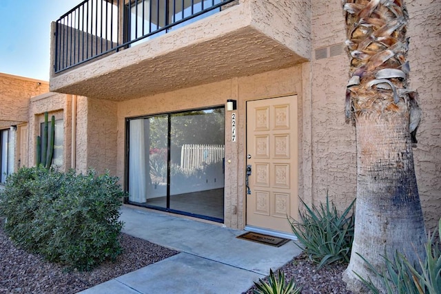 doorway to property with a balcony