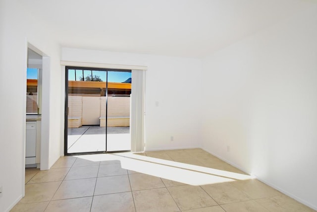 empty room with light tile patterned flooring