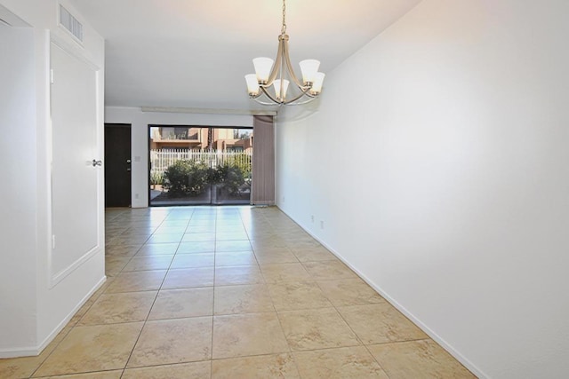 interior space featuring light tile patterned flooring and a notable chandelier