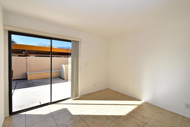 view of tiled spare room