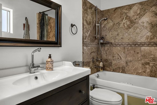 full bathroom with vanity, shower / tub combo with curtain, and toilet