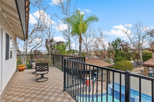 view of patio / terrace with a fenced in pool