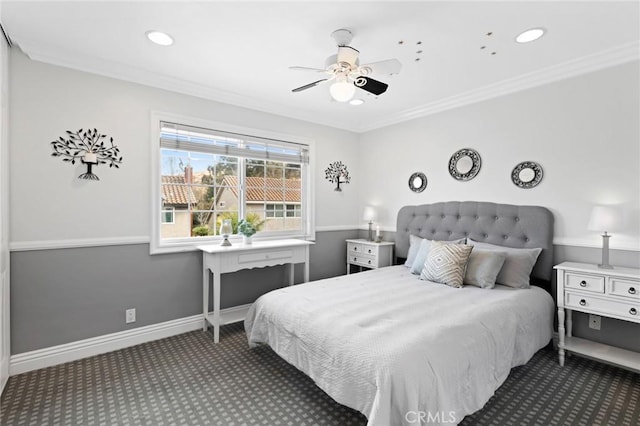 bedroom with ornamental molding, ceiling fan, and dark colored carpet