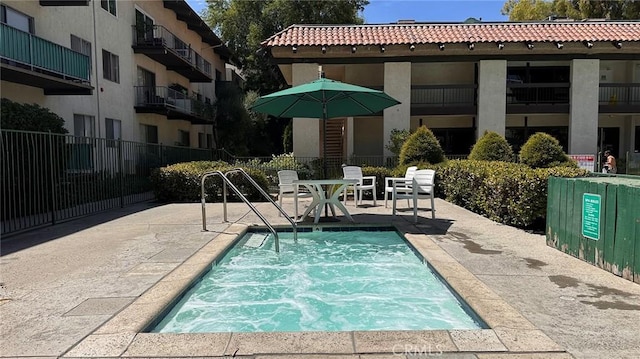 view of pool with a patio