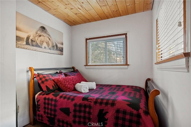 bedroom featuring wood ceiling