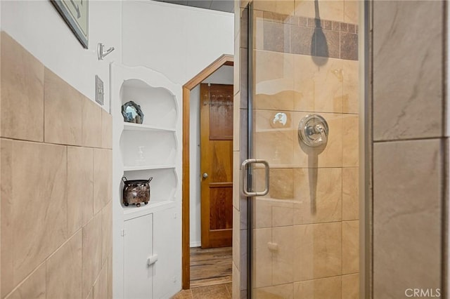 full bath featuring a shower stall