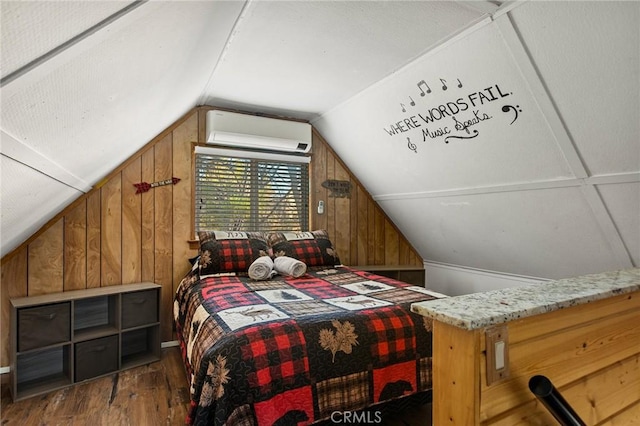bedroom with a wall mounted air conditioner, wood finished floors, vaulted ceiling, and wood walls