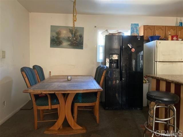 view of carpeted dining room