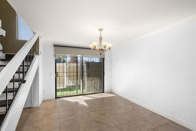 unfurnished dining area featuring a chandelier, crown molding, stairway, and baseboards