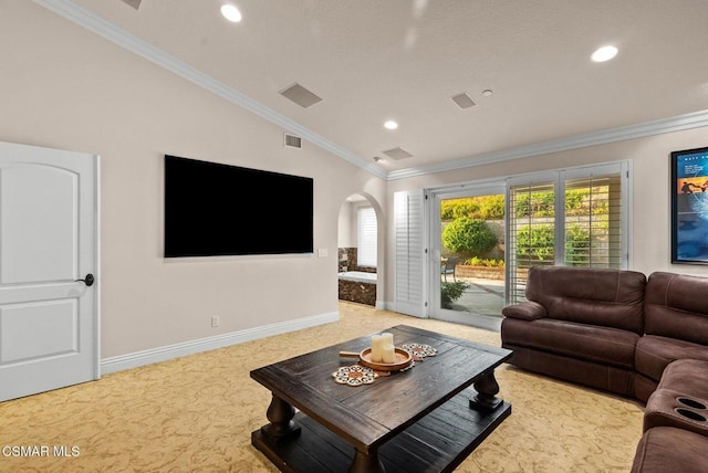 living room with crown molding, vaulted ceiling, and carpet flooring