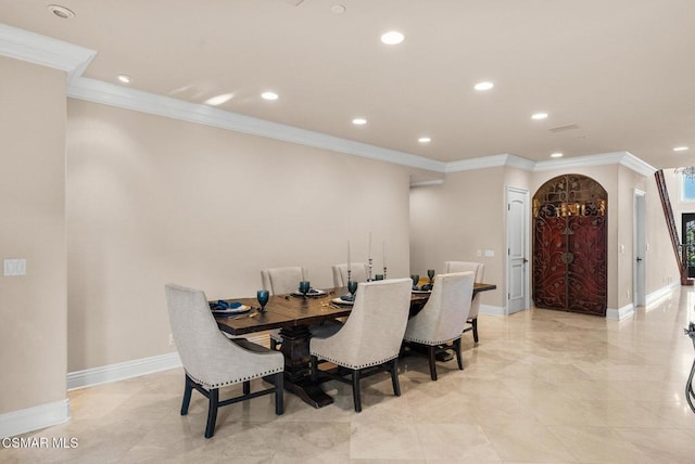 dining area featuring ornamental molding