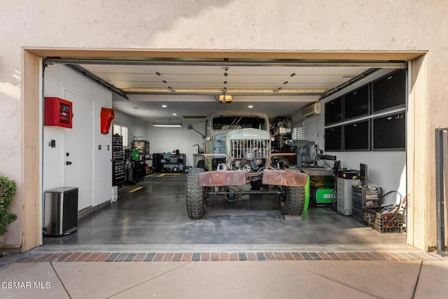 garage with an AC wall unit