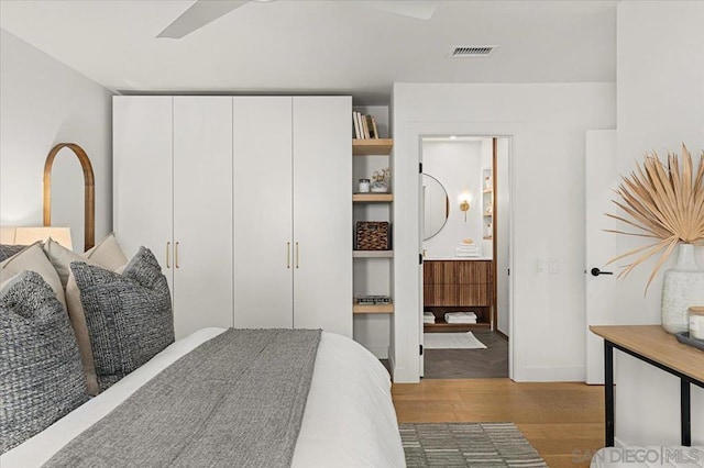 bedroom with light wood-type flooring