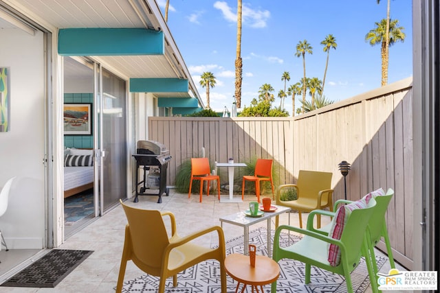 view of patio / terrace featuring a grill