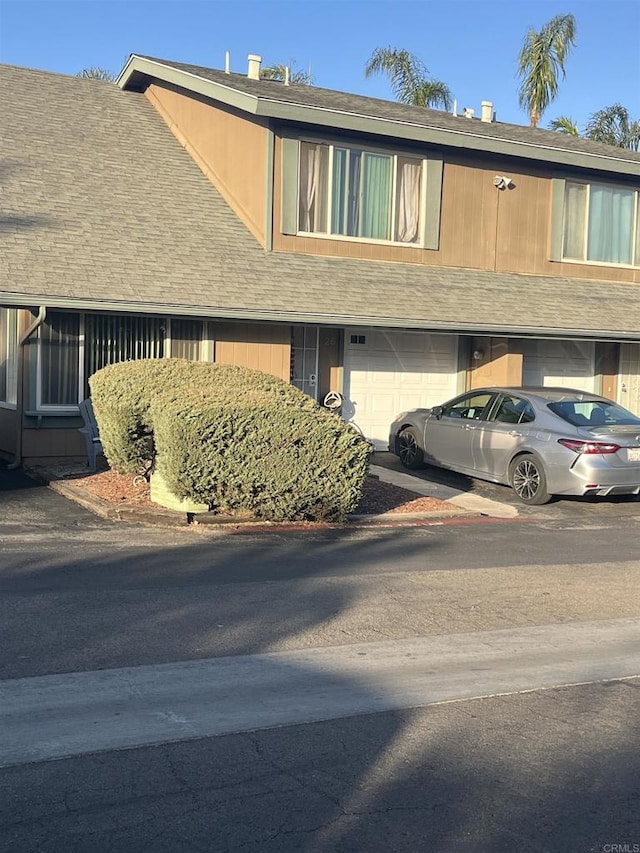 exterior space with a garage