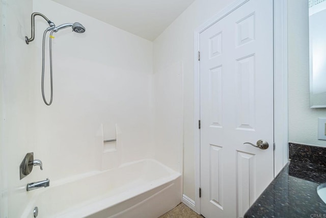 bathroom featuring shower / washtub combination and tile patterned flooring