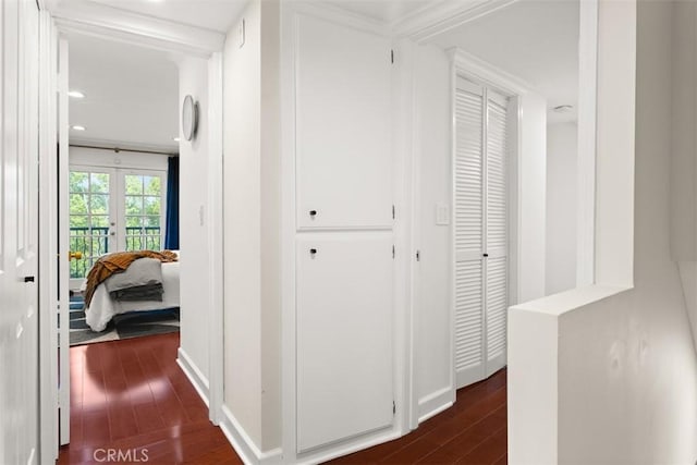 hallway featuring dark hardwood / wood-style flooring