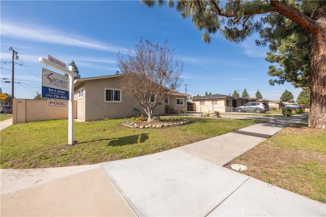 view of front of property with a front yard